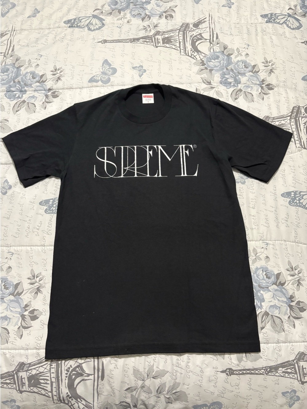 Supreme Black Tee with White Stylized Script Logo